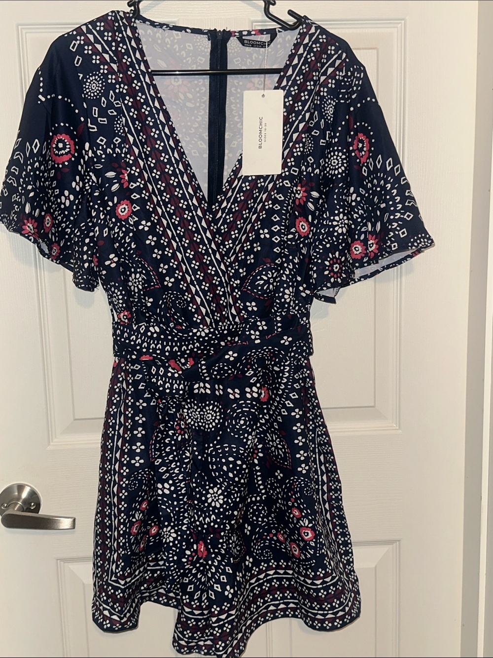 BloomChic Navy Floral Print Romper with Pink Accents